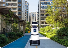 Load image into Gallery viewer, CatCop security patrol robot in a residential setting
