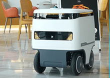 Load image into Gallery viewer, Speedybot Pro indoor and outdoor delivery robot in a residential community