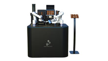 Load image into Gallery viewer, The Useabot Dual-Arm Robotic Coffee Station by Elite Robots, available as an Enclosed Type or Open-Style Workbench, features two white robotic arms preparing drinks on a sleek black counter with a self-service menu stand for easy selection.
