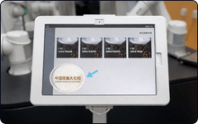 Load image into Gallery viewer, A tablet menu with drink images and an arrow to a cup marked "Chinese Opera Culture Week" is shown, while Useabot’s Dual-Arm Robotic Coffee Station by Elite Robots operates in the background, showcasing a self-service coffee experience.
