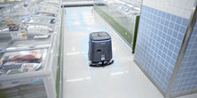 Load image into Gallery viewer, PUDU CC1 Pro cleaning along refrigerated retail display counters
