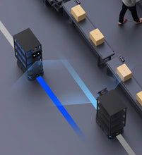 Load image into Gallery viewer, PUDU T300 robots following an illustrated route beside a conveyor with cartons

