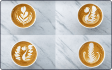 Load image into Gallery viewer, Four lattes with artistic leaf and heart designs sit on a marble surface, crafted by the Single-Arm Robotic Coffee Station (Enclosed or Open-Style Workbench) from Useabot, showcasing precise barista skills in a self-service coffee experience.
