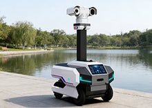 Load image into Gallery viewer, Specopsbot AI advanced patrol robot in a scenic area
