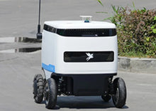 Load image into Gallery viewer, Speedybot Pro indoor and outdoor delivery robot in a factory
