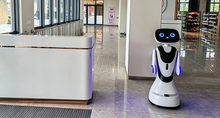 Load image into Gallery viewer, Timo AI reception robot — at reception
