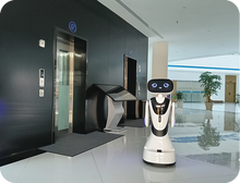 Load image into Gallery viewer, Timo AI reception robot — in an exhibition hall

